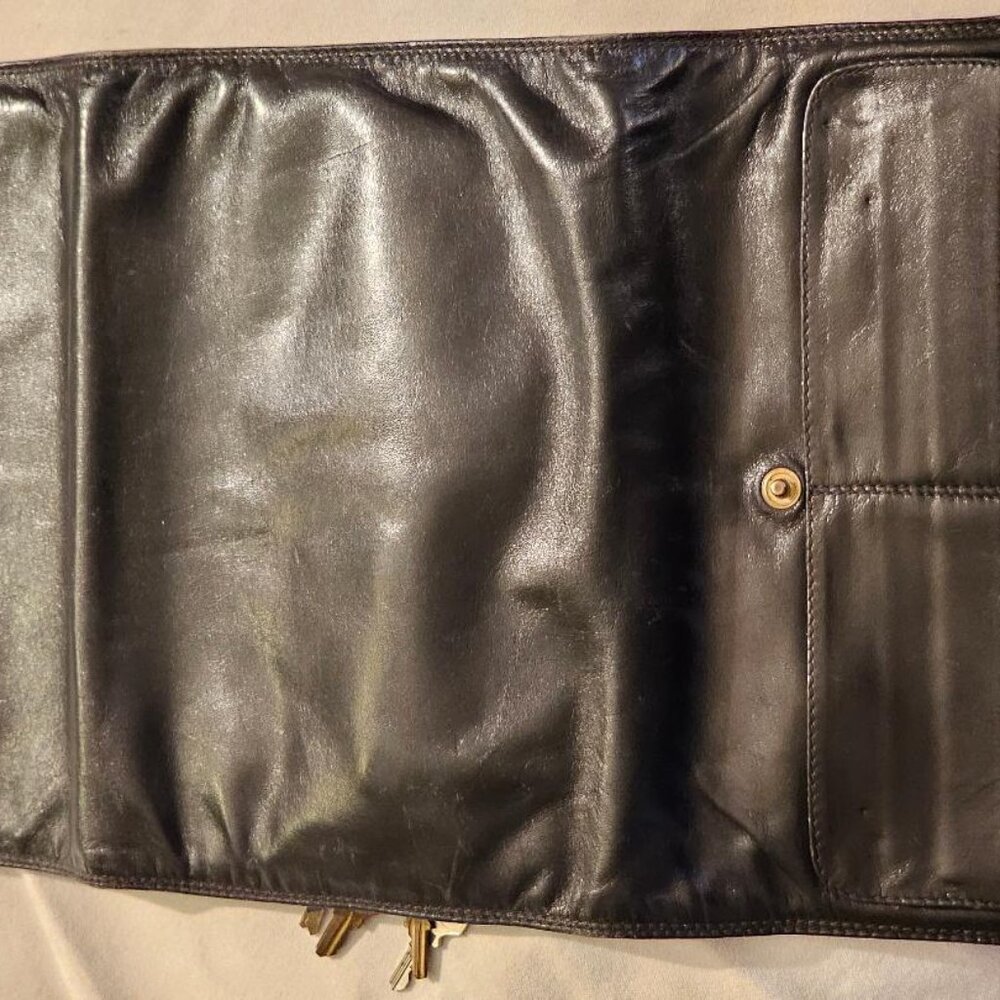 black leather multipurpose travel wallet
